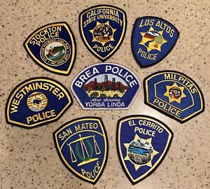 LOT OF 8 CALIFORNIA POLICE SHOULDER PATCHES, 7 NEW, 1 PREOWNED. FREE SHIPPING.