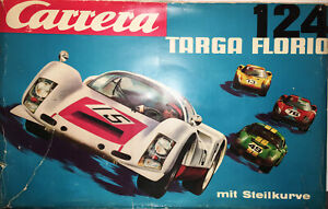 Carrera Targa Florio 124 + zusätzliche Fahrzeuge + Fahrbahnen + Trafo