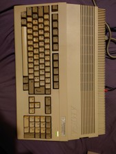 Vintage RETRO COMMODORE AMIGA A500 PLUS.  console +games 