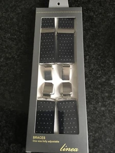 Linea Hombre Brackets Negro con Mancha Blanca Color Plata Cierre Ajustable - Imagen 1 de 2