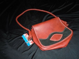 burnt orange leather handbolsas