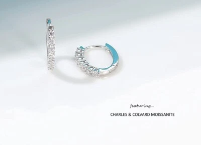 Pendientes de aro ovalados de moissanita de 0,50 quilates (Charles y Colvard) Foto 1 de 2