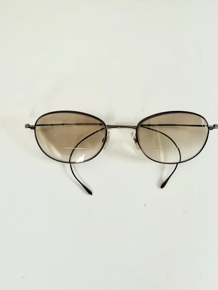 Gafas redondas sin montura de alambre vintage de Calvin Klein años 80 gafas de bronce Japón raras Foto 1 de 4