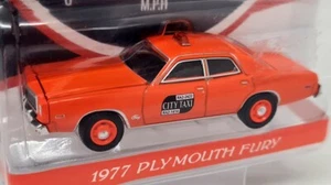 Greenlight 1/64 1977 Plymouth Fury City Taxi 7 Miles Diecast Model Car - Bild 1 von 4