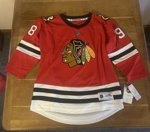 NHL Chicago Blackhawks Connor Bedard Trikot neu mit Etikett Herren L/XL *Druckfehler* - Bild 1 von 8