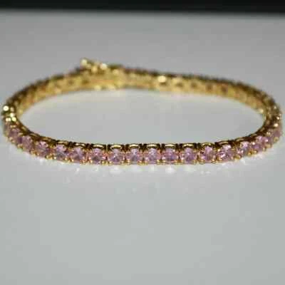 Brazalete de tenis para mujer de zafiro rosa creado en laboratorio redondo de 5 quilates de oro amarillo de 14 quilates Foto 1 de 4