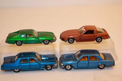 4 Coches TOMICATOMI vintage años 70 Mercedes/Cadillac/Jaguar/Mazda Foto 1 de 4