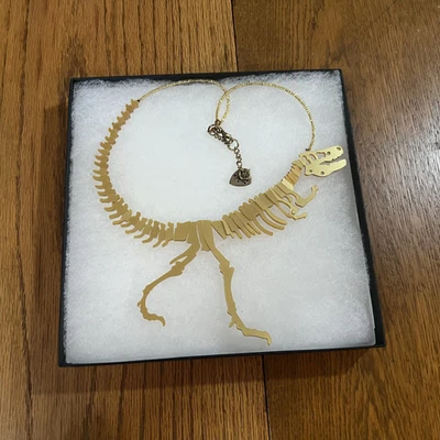 [Tatty Devine] T-Rex Oro Dinosaurio Esqueleto - Collar Distintivo Foto 1 de 3