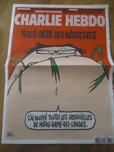 CHARLIE HEBDO 1230 PLACE GOUVERNEMENT BOUFFE GRENOUILLE RISS fev 2016 NEUF - Picture 1 of 1