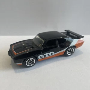 1995💥DIECAST MATCHBOX 70 PONTIAC GTO schwarz mit orange-weißen Decals💥 - Bild 1 von 5