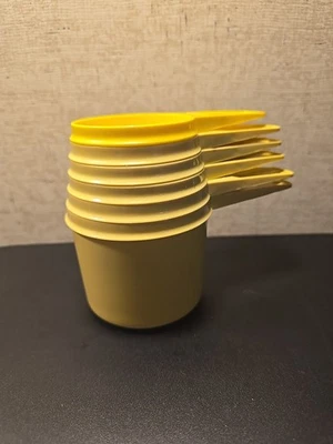 Vintage Tupperware Yellow Measuring Cups Plastic Complete Set of 6 - Image 1 of 4