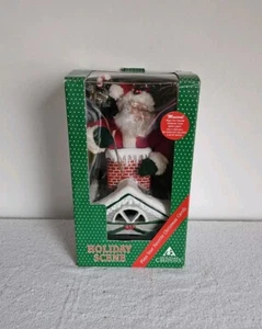 VINTAGE CHRISTMAS HOLIDAY CREATIONS 1993 MUSICAL SANTA CLUMBING DOWN CHIMNEY - Picture 1 of 10