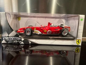 FORMULE 1 FERRARI 248 F1 MICHAEL SCHUMACHER MARLBORO SCALE 1/18 HOTWHEELS - Foto 1 di 12