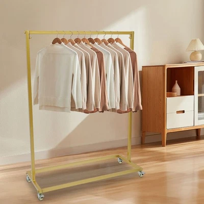 Perchero dorado de alta resistencia con ruedas Foto 1 de 4