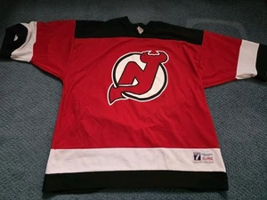 Logo 7 NHL Hockey Trikot NJ Devils Brodeur #30 Größe XL rot mit weiß & schwarz - Bild 1 von 6