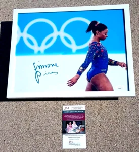 SIMONE BILES SIGNED + FRAMED 11x14 Photo JSA COA USA GYMNASTICS OLYMPICS - Picture 1 of 3