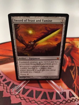 Sword of Feast and Famine Mirrodin Besieged Regular - Image 1 of 4
