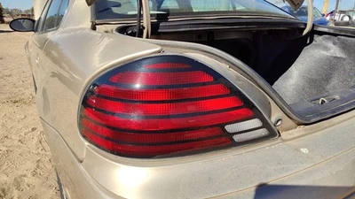 Luz trasera izquierda para conductor Pontiac Grand Am 1999-2005 lámpara de freno trasera OEM 22612877 Foto 1 de 4