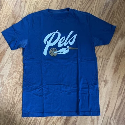 Camiseta DIRTY COAST Nueva Orleans PELICANS Med (leer) Camiseta AZUL Gráfica Foto 1 de 4
