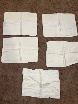 5 prendas blancas Gerber para eructos para bebé usadas Foto 1 de 4