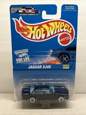 Coche Jaguar XJ40 1996 de colección Hot Wheels #609 retro nuevo de colección HW tarjeta azul nuevo sellado Foto 1 de 4