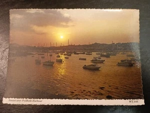 25 X Vintage Crinkle Cut Sunset Over Pwllhelli Harbour Postcards - Picture 1 of 8