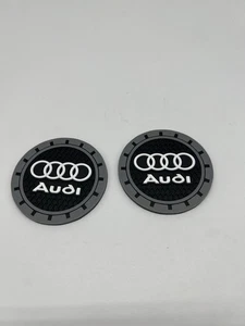 AUDI Juego de 2 Tazas Alfombrilla Coche Porta Bebidas Inserto Silicona Posavasos Set - Imagen 1 de 1