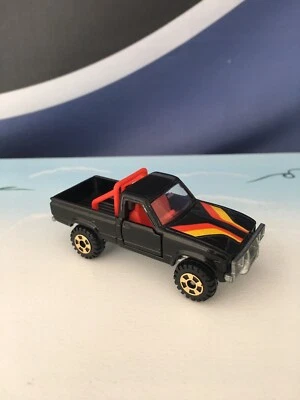 💚⭐️ TOMICA Toyota Hilux 4x4 Nº61 - 1/62 COMO NUEVO / COCHES DE BOLSILLO / Camión Negro Foto 1 de 4