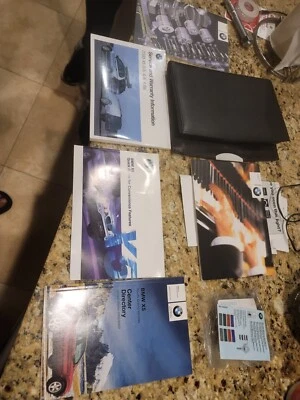 2003 BMW X5 владельца руководство операторов книги плюс кожаный чехол BMW. ИЗЯЩНЫЙ  - Изображение 1 из 4