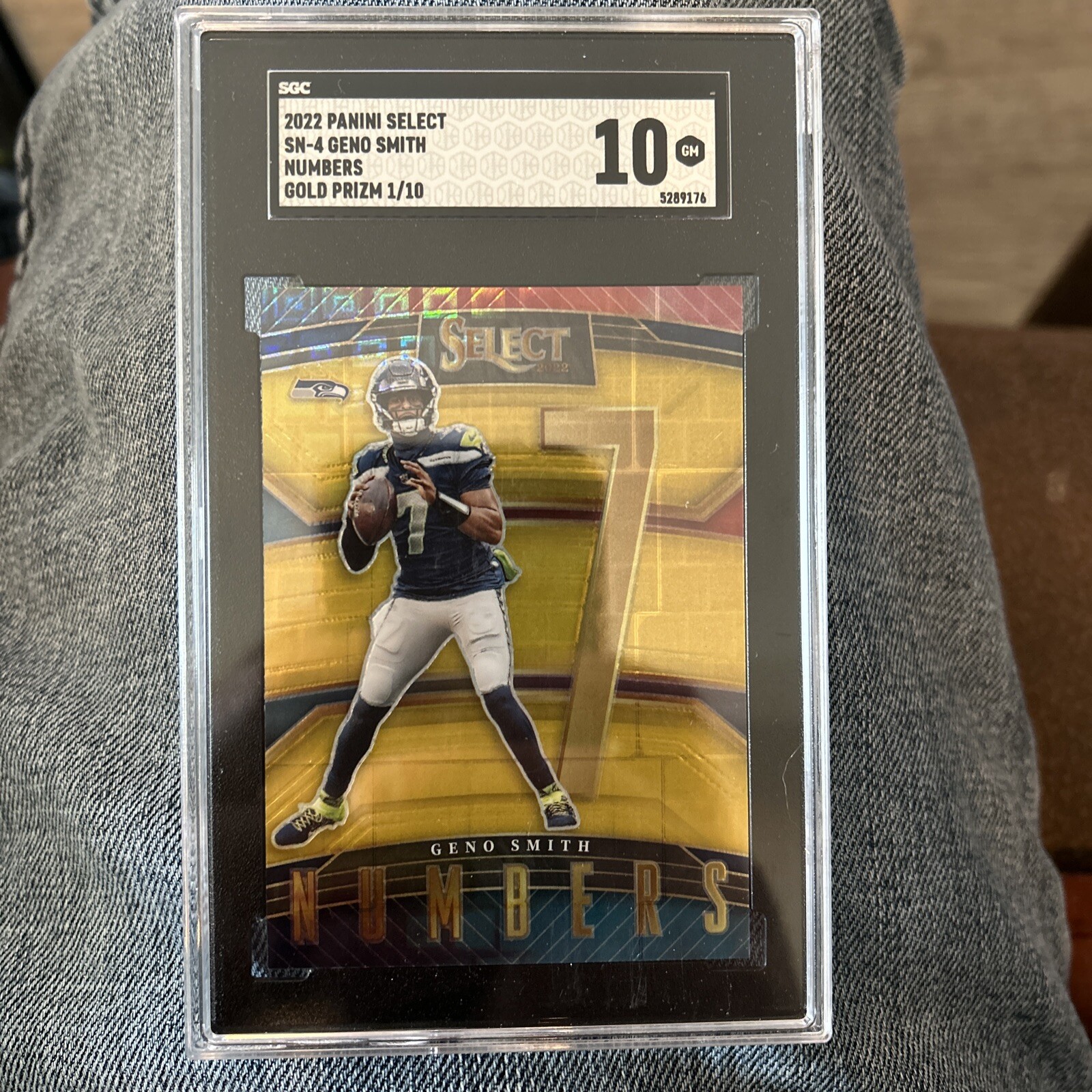 2022 Panini Select Geno Smith Numbers Gold Prizm /10