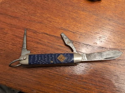 Cuchillo de campamento oficial Camillus BSA Cub Scout años 60-70 azul EE. UU. Foto 1 de 4