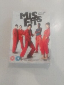 Misfits: Series 1 and 2 DVD card case worn but discs very good