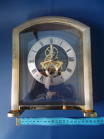 SEIKO SKELETON QUARTZ CLOCK,  22 cm high x 18 cm x 6 cm, model number  QAW 102 Cover