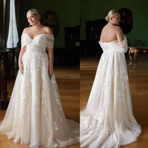 Abiti da sposa taglie forti spalle scoperte scollo a cuore applicazioni lunghezza pavimento - Foto 1 di 10