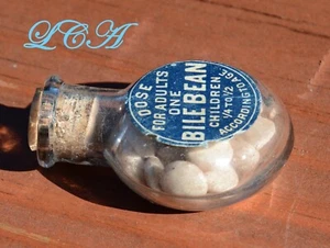 BONITAS ETIQUETAS DE BOTELLAS DE PÍLDORAS ANTIGUAS EN FORMA DE TAMBOR diminutas de frijoles de bilis de Smith en relieve - Imagen 1 de 3
