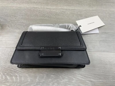 Bolso de mano Nicole Miller para mujer de cuero negro con asa superior con correa bandolera Foto 1 de 4