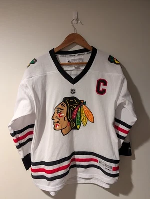 Camiseta deportiva de hockey Chicago BlackHawks Toews Reebok blanca grande/X-grande de la NHL Foto 1 de 4