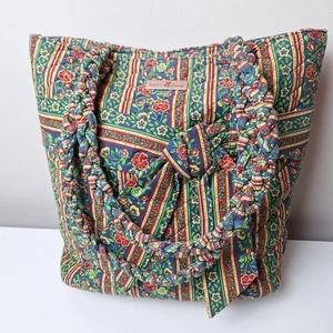 Isabellas Journey gesteppte Blumen Schultertasche mit Schleife geflochtene Henkel Beuteltasche Handtasche - Bild 1 von 13