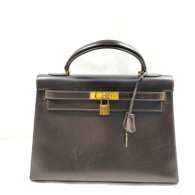 SIN TARIFA Bolso de Mano Hermes Kelly 32 Marrón Caja Becerro 4523034 Foto 1 de 4