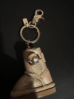 Mini llavero/dije de bolsa Ugg Gold Boot Foto 1 de 3