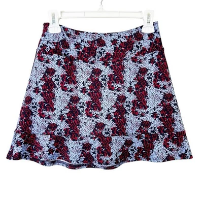 Falda corta de golf Golftini Cosmic para mujer talla XS roja azul Foto 1 de 4