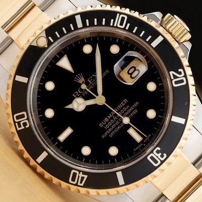 RELOJ ROLEX SUBMARINER FECHA 16613 LN 40MM ORO AMARILLO 18K ACERO 2 TONOS NEGRO Foto 1 de 4