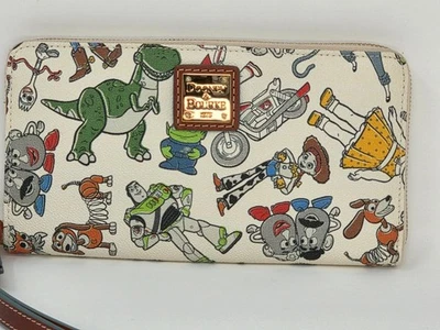 GUC DISNEY DOONEY & BOURKE TOY STORY ZIP WALLET FORKY WOODY REX HAM BUZZ SLINKY - Image 1 of 4