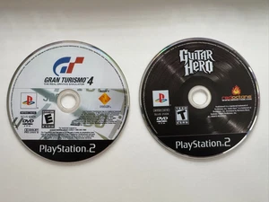 Gran Turismo 4 und Guitar Hero für Playstation 2 Spiele Konvolut.  Nur Discs. - Bild 1 von 3