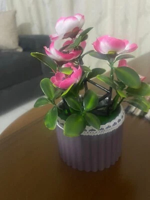 Elegant Purple Plastic Vase With Bright Green Paper And Realistic Pink Roses - Image 1 of 4