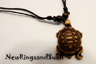 Collar con cordón de tortuga marina cuentas de madera nudo deslizante abierto y cerrado resina marrón Foto 1 de 2