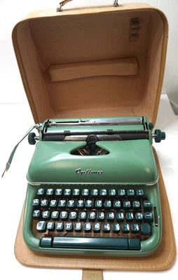 MÁQUINA DE ESCRIBIR MANUAL VINTAGE OPTIMA ELITE VERDE ALEMANIA CON ESTUCHE DE TRANSPORTE BONITA Foto 1 de 4