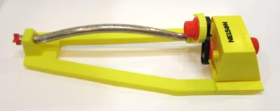 Aspersor de jardín de barrido Nelson de 15" de plástico amarillo vintage buen funcionamiento años 90 Foto 1 de 4