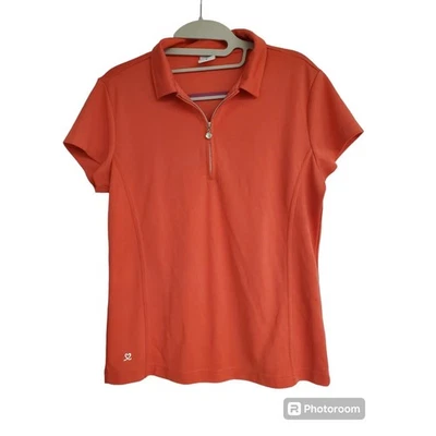 Polo de golf coral deportivo diario para mujer con cremallera de estrás | Talla mediana Foto 1 de 4
