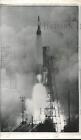 1962 Press Photo Ground fog nearly clouds Atlas missile as it launches to space